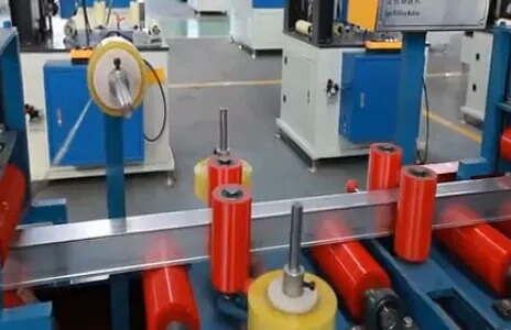 Aluminum profile tape and film sticking machine